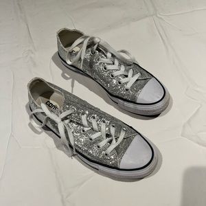 White sparkly Converse. Size 7 women’s or size 5 men’s.